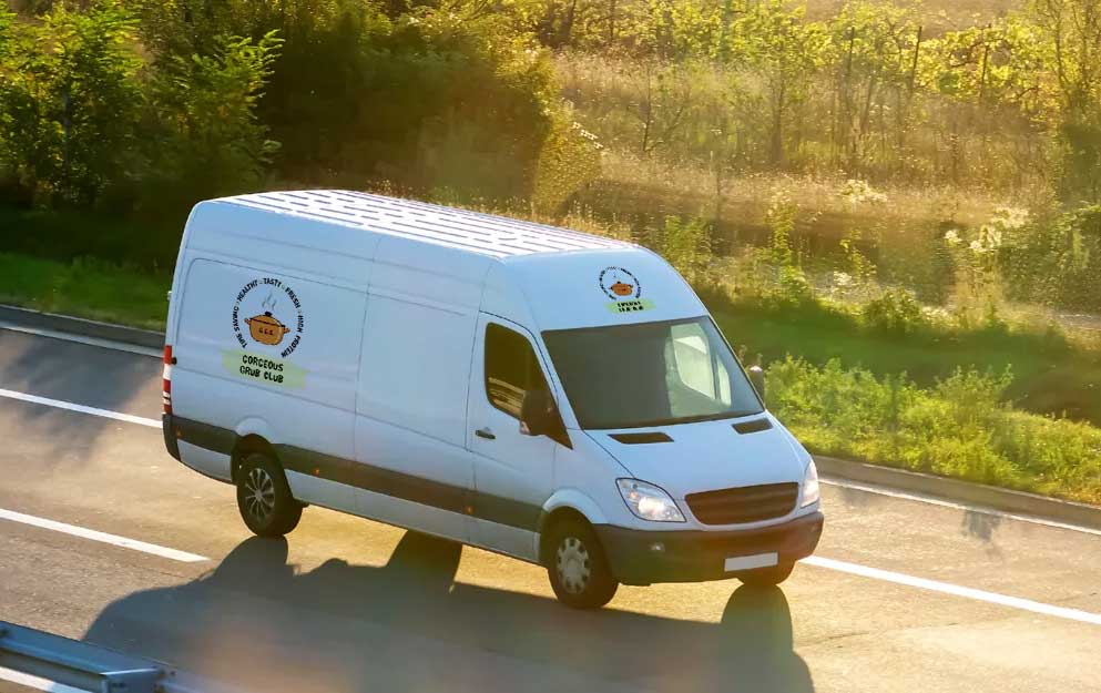 Gorgeous Grub Club delivery van driving through the Yorkshire countryside near Thirsk, Ripon , York and Harrogate.